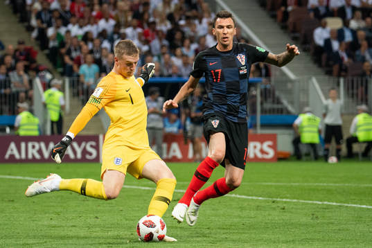 goalkeeper Jordan Pickford of England and Mario Mandzukic