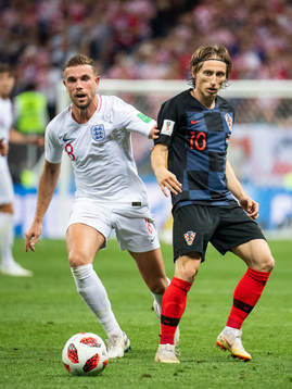 Jordan Henderson of England and Luka Modric of Croatiain