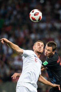 Jordan Henderson of England and Mario Mandzukic of Croatia