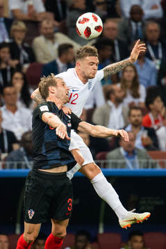 Kieran Trippier of England and Ivan Strinic of Croatia