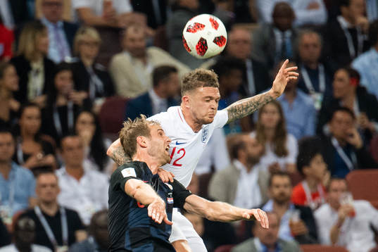 Kieran Trippier of England and Ivan Strinic of Croatia
