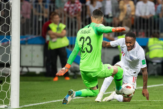 Raheem Sterling of England and goalkeeper Danijel Subasic