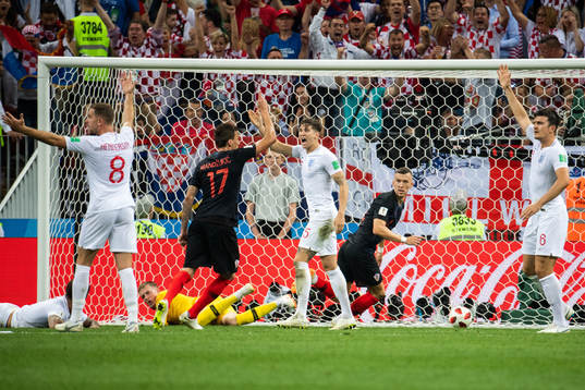 Jordan Henderson, John Stones and Harry Maguire react as