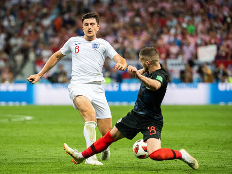 Harry Maguire of England and Ante Rebic of Croatia