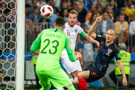 Domagoj Vida of Croatia defends against Harry Kane of