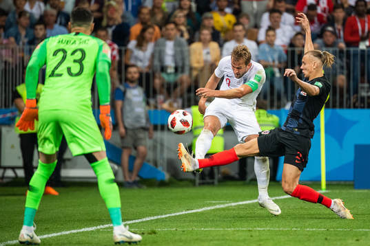 Domagoj Vida of Croatia defends against Harry Kane of