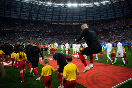 Players of Croatia and of England enters the pitch prior to