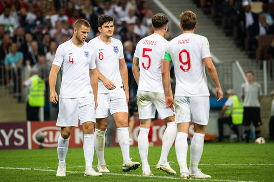 Eric Dier and Harry Maguire look dejected