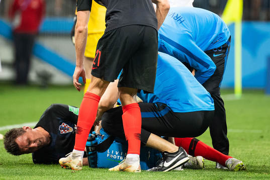 Mario Mandzukic lies down and is getting mediacal attention