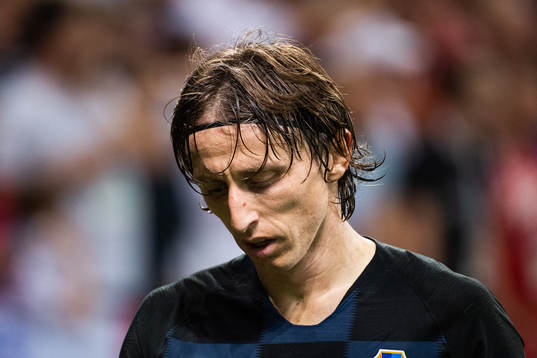 Luka Modric of Croatia looks dejected