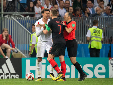 Irritated between Dele Alli of England and Ivan Rakitic of