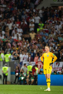 Goalkeeper Jordan Pickford of England looks dejected