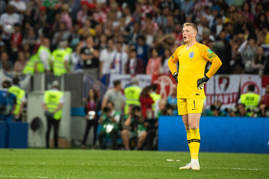 Goalkeeper Jordan Pickford of England looks dejected