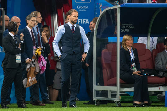 Head coach Gareth Southgate of England looks dejected
