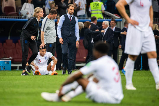 Jesse Lingard and head coach Gareth Southgate of England