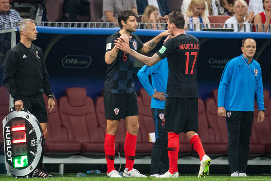 Mario Mandzukic is substituted for Vedran Corluka of Croatia