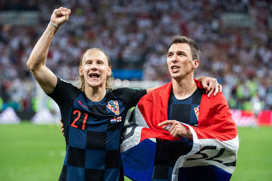 Domagoj Vida and Mario Mandzukic of Croatia celebrate