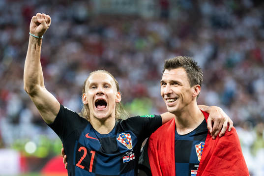 Domagoj Vida and Mario Mandzukic of Croatia celebrate
