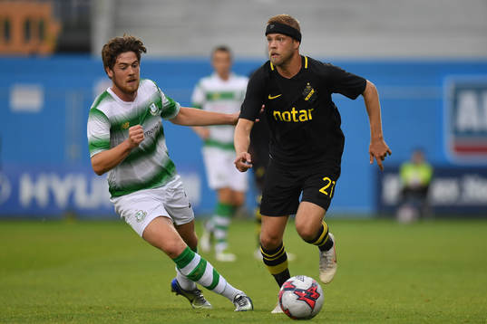 Daniel Sundgren of AIK in action against Sam Bone of