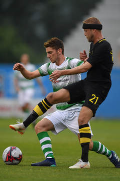 Dylan Watts of Shamrock Rovers in action against Daniel