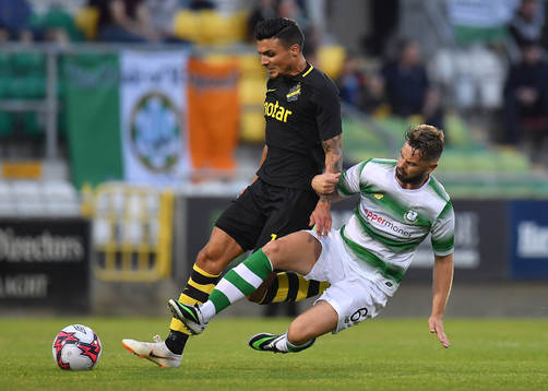 Ahmed Yasin of AIK is tackled by Greg Bolger of Shamrock