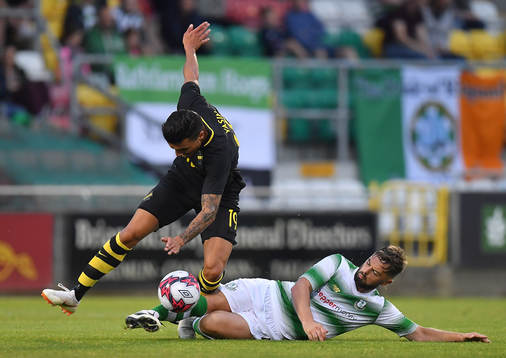 Ahmed Yasin of AIK is tackled by Greg Bolger of Shamrock