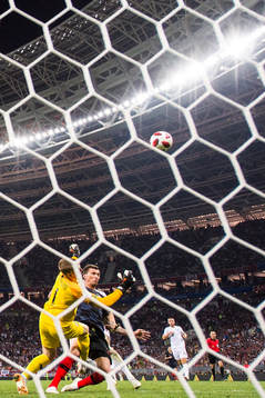 Mario Mandzukic of Croatia in action with goalkeeper Jordan