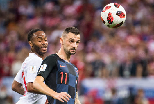 Marcelo Brozovic of Croatia and Raheem Sterling of England