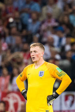 Goalkeeper Jordan Pickford of England looks dejected