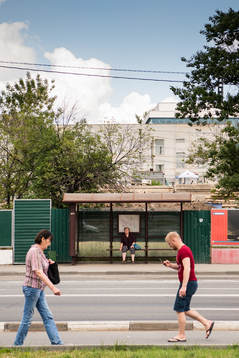 People are seen walking the street