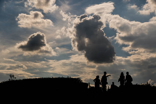 General view of people in silhouettes