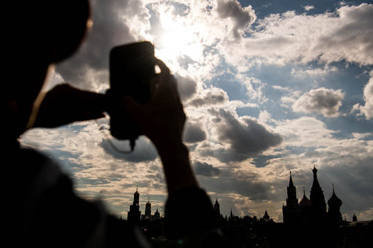 People take pictures of Saint Basil's Cathedral