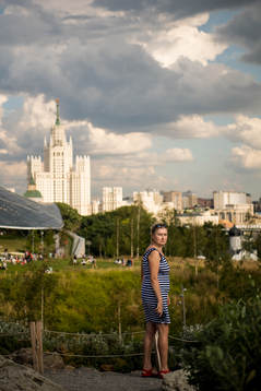 A women is seen in a park in central Moscow