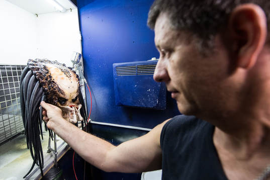 Igor Vladimir works with building the masks and bobys at