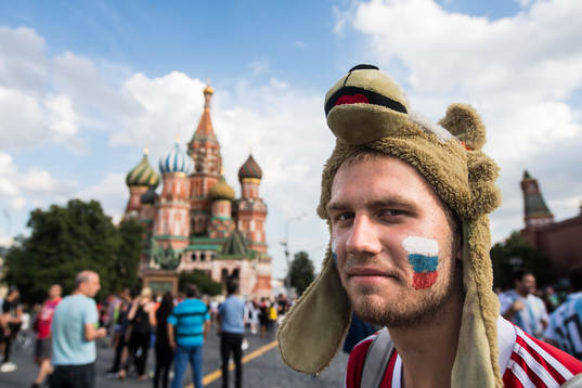 A fan of Russia in front of The Saint Basil's Cathedral at