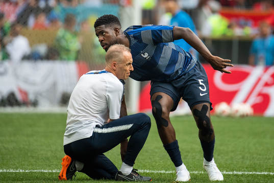 Samuel Umtiti of France gets medical attention