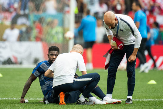 Samuel Umtiti of France gets medical attention