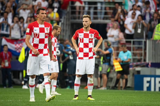 Ivan Rakitic of Croatia looks dejected