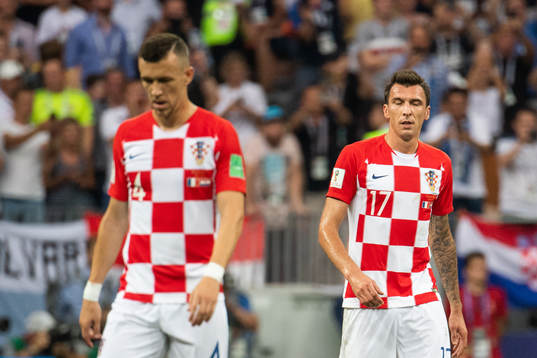 Mario Mandzukic and Ivan Perisic of Croatia looks dejected