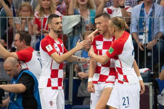 Ivan Perisic (middle) celebrates with team mates