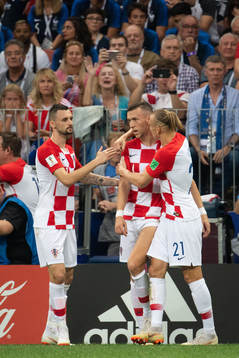 Ivan Perisic (middle) celebrates with team mates