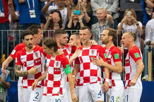 Ivan Perisic (middle) celebrates with team mates