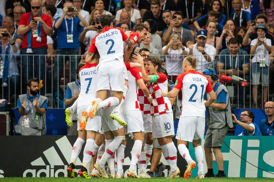 Luka Modric and Ivan Perisic celebrates with team mates