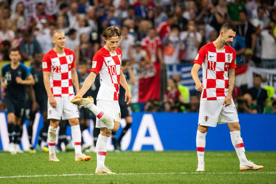 Luka Modric and Marcelo Brozovic of Croatia looks dejected