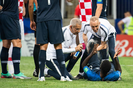 Samuel Umtiti of France gets medical attention