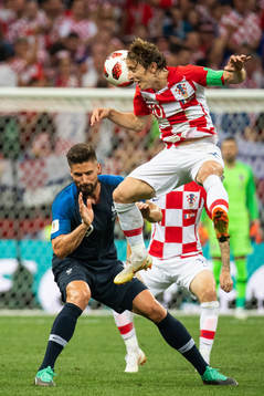 Olivier Giroud of France and Luka Modric of Croatia