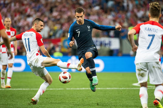 Marcelo Brozovic of Croatia and Antoine Griezmann of France