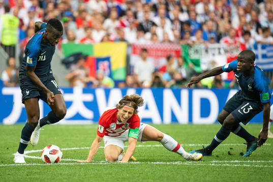 Blaise Matuidi of France see Luka Modric of Croatia falls