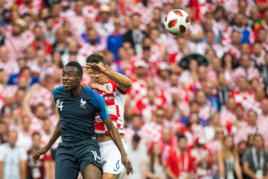 Blaise Matuidi of France competes for the ball with Dejan