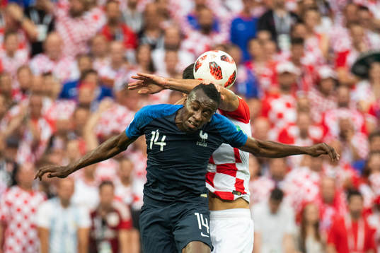 Blaise Matuidi of France competes for the ball with Dejan